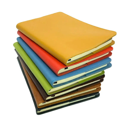 RUSTIK COLOURFUL LEATHER SLIP ON COVER + JOURNAL stacked in vibrant colors, showcasing variety for journaling.