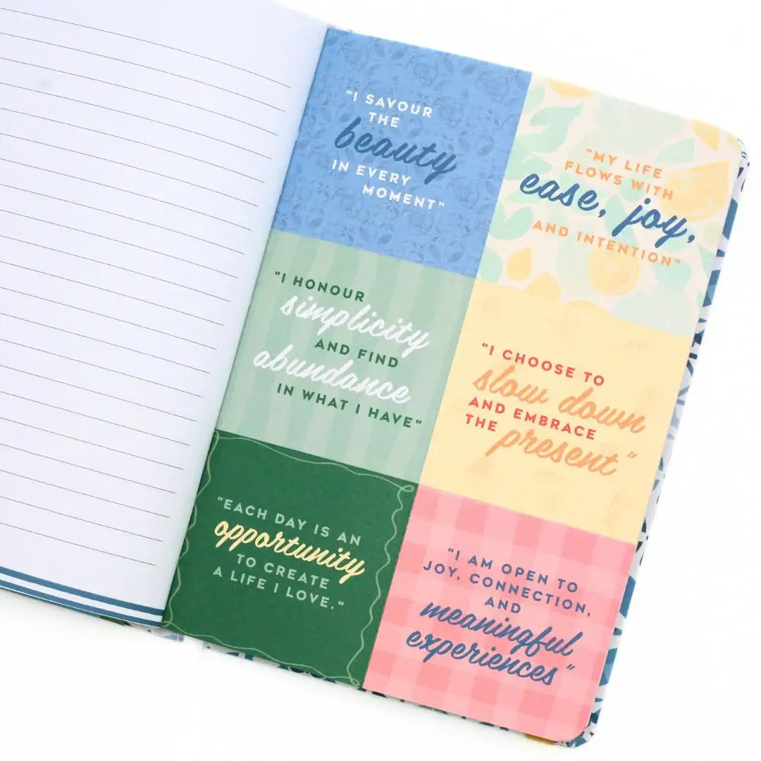 A page from the La Dolce Vita Vision Journal featuring motivational quotes on mindfulness and joy.