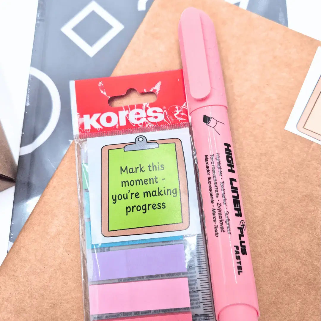 Exam Care Package with sticky notes and highlighter for effective study organization and motivation.