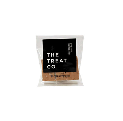 Pecan Nut Fudge in clear packaging by The Treat Co, showcasing its creamy and nutty texture.