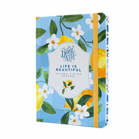 La Dolce Vita Vision Journal featuring a vibrant floral design with lemons and a quote about beauty.