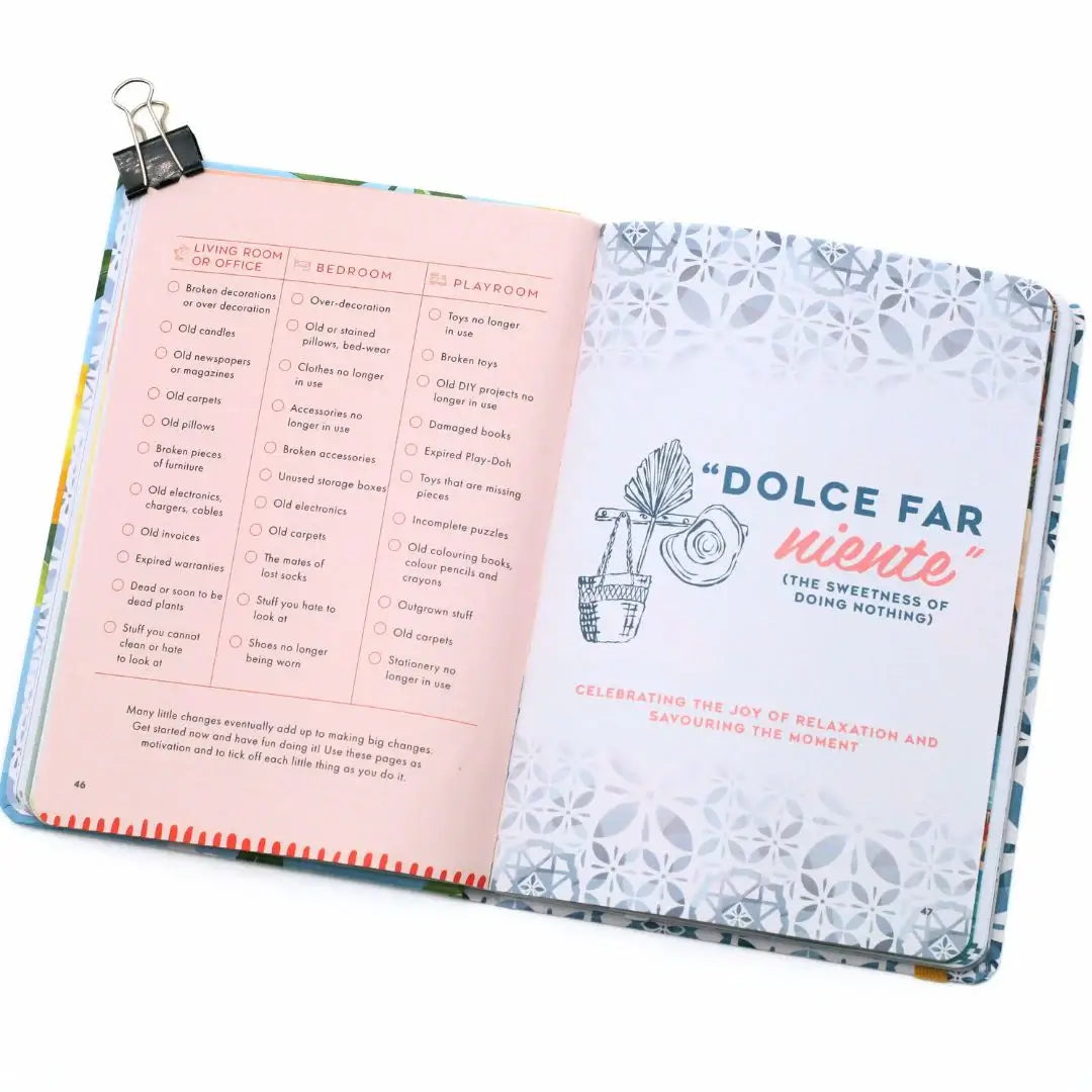 Open pages of the La Dolce Vita Vision Journal with prompts for relaxation and mindfulness.