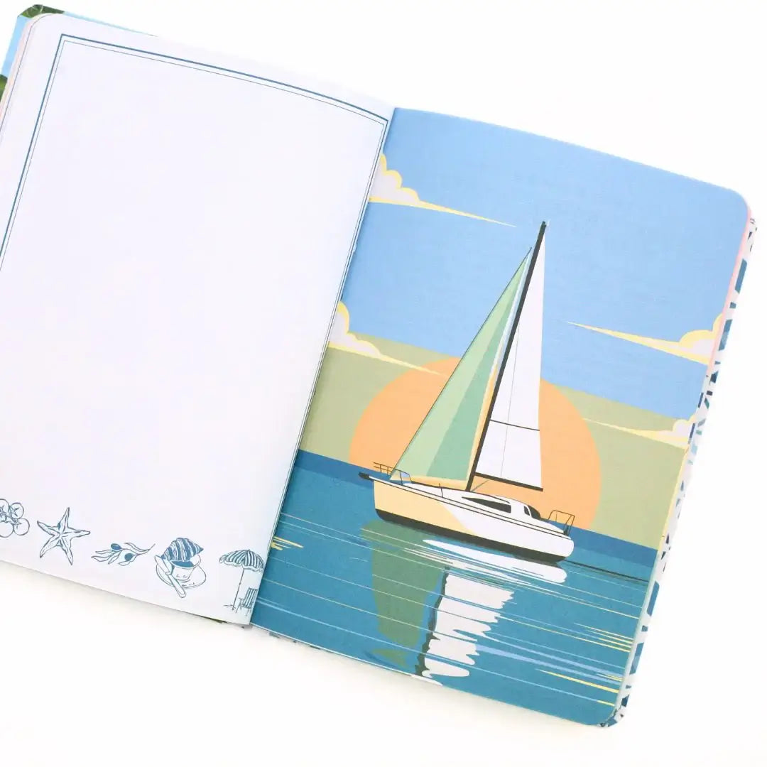Interior of the La Dolce Vita Vision Journal with sailboat illustration and blank page for writing.