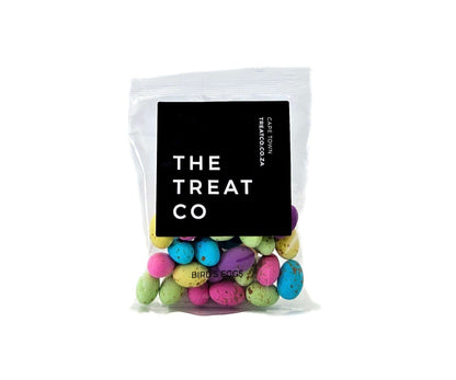 Colorful Bird’s Eggs in a clear package from The Treat Co, perfect for snacking or gifting.