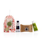 L'Occitane Essential Trio For Men set featuring Cade cream, hand cream gel, and milk soap in festive packaging.