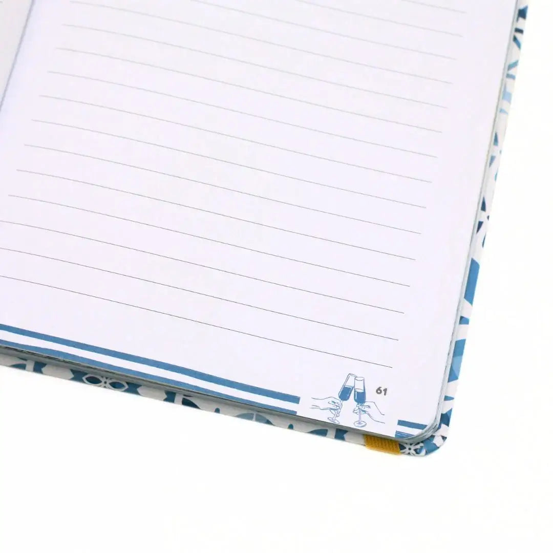La Dolce Vita Vision Journal open page with lined paper and decorative cover design.