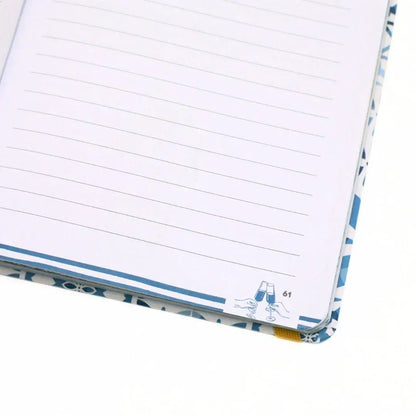La Dolce Vita Vision Journal open page with lined paper and decorative cover design.