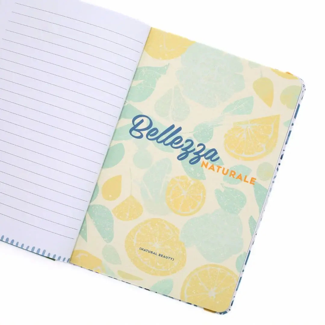 La Dolce Vita Vision Journal open page featuring colorful citrus design and inspirational quote on natural beauty.