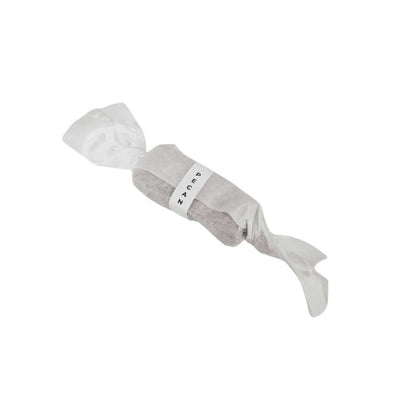 Pecan Nut Fudge wrapped in a stylish paper, showcasing its creamy texture and nutty flavor.