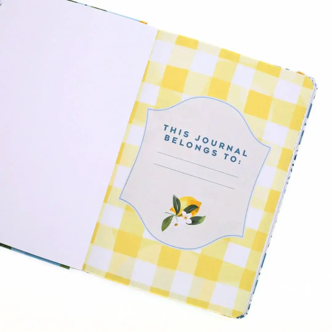 La Dolce Vita Vision Journal interior page with a yellow checkered design and 'This Journal Belongs To' section.
