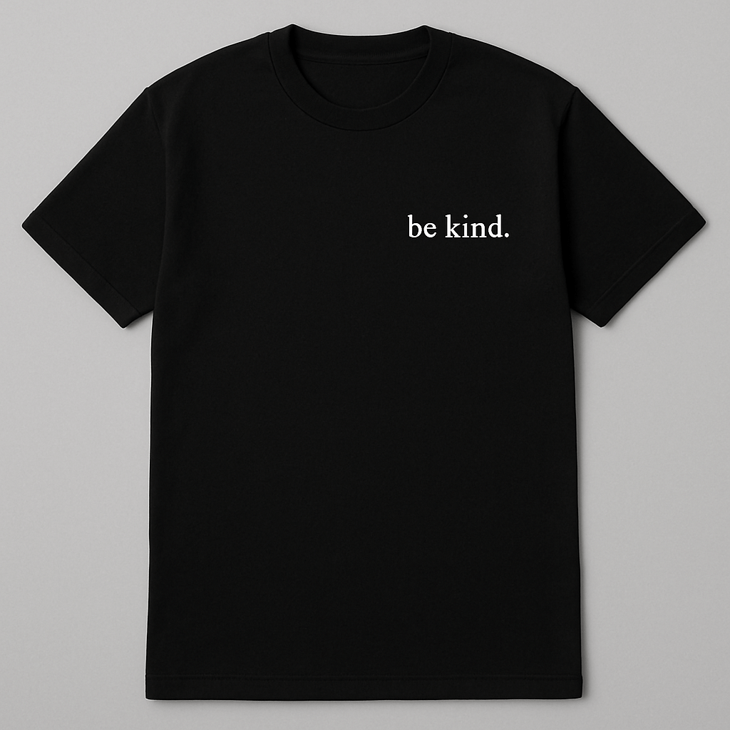 Be Kind T-shirt in black featuring a white text print that reads 'be kind.'