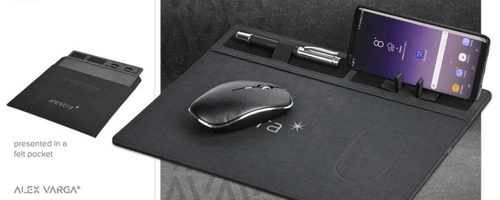 Black desk organiser with phone, mouse, and other items on a dark surface